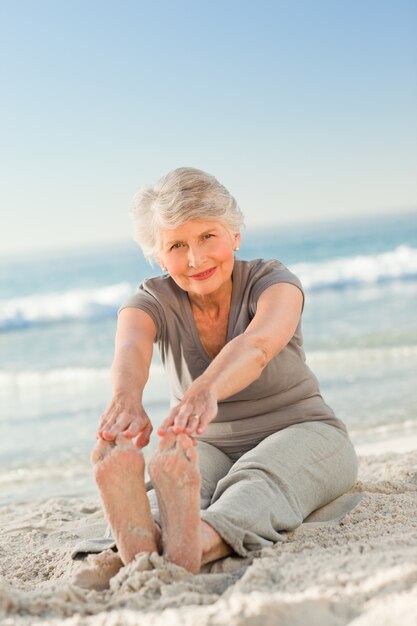 Elderly woman doing her streches