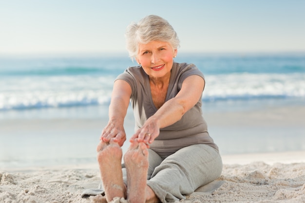 Elderly woman doing her streches