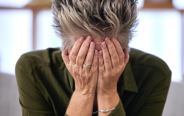 Elderly woman face and stress for depression fatal results and emotional with distress mental health or burnout Mature female person lady and shame with illness health and medical diagnosis