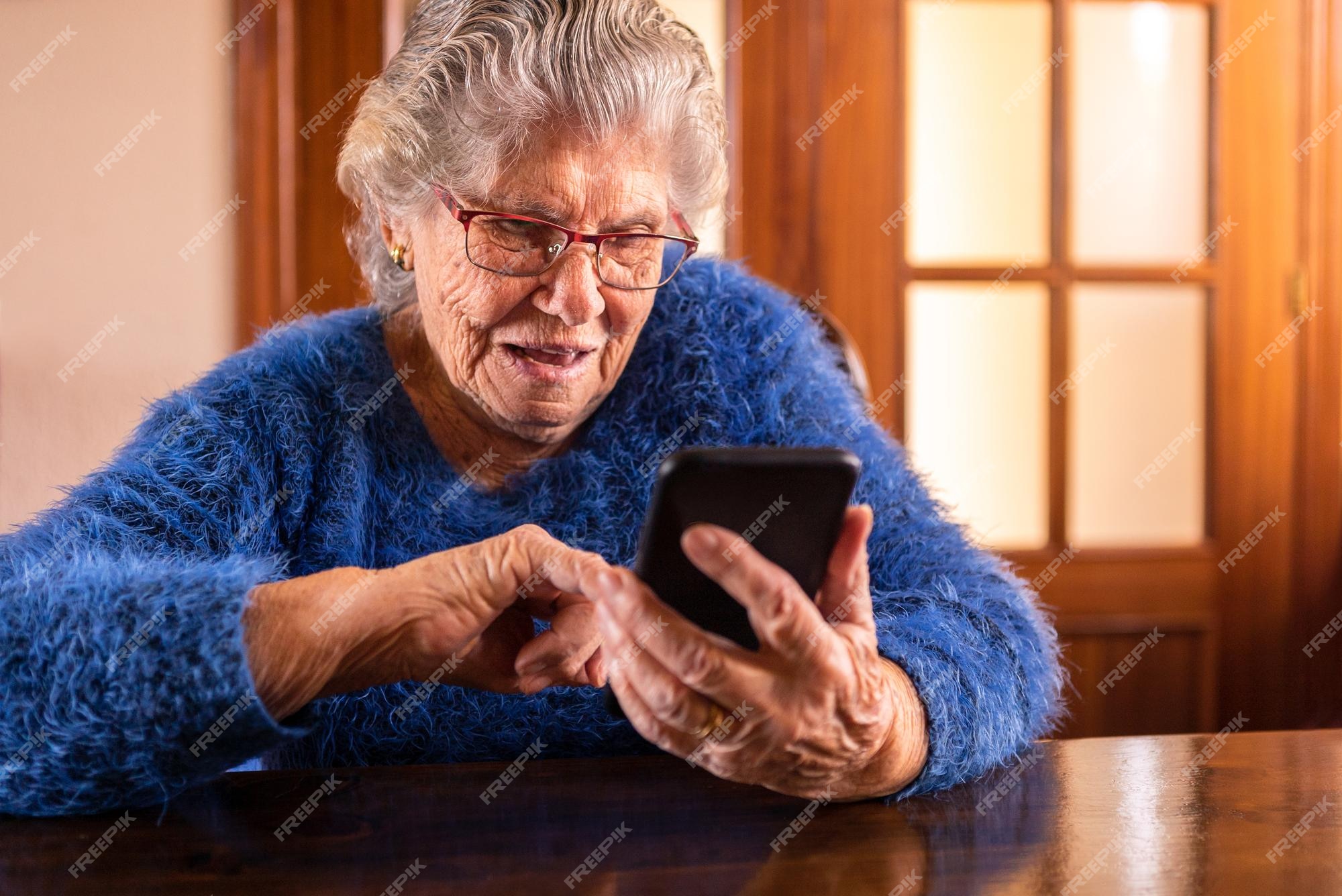 Elderly stylish granny caucasian mature woman using app on smartphone for  online shopping confused face expression. Chroma key background. Old  grandmother in fashion wearing browsing on mobile phone Stock Photo - Alamy