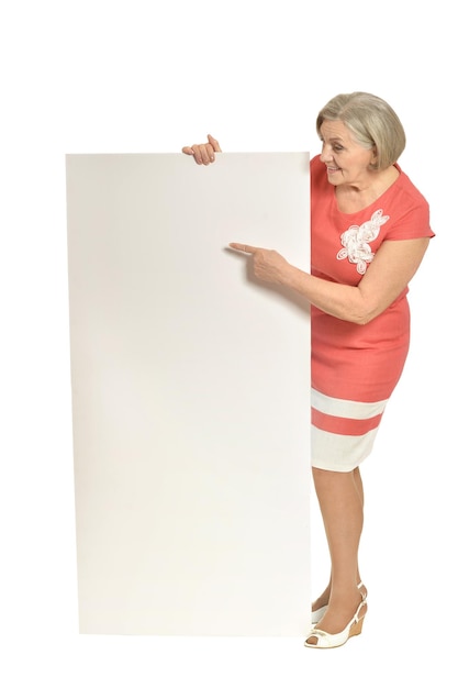 Elderly woman pointing to blank card