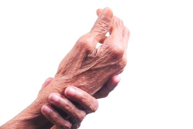 Elderly woman suffering from pain isolated on white.