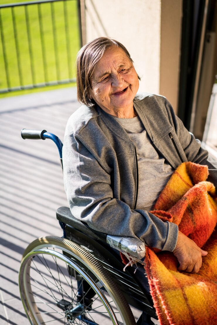 Elderly woman in wheelchair