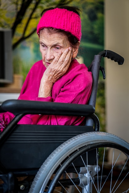 Elderly woman in wheelchair