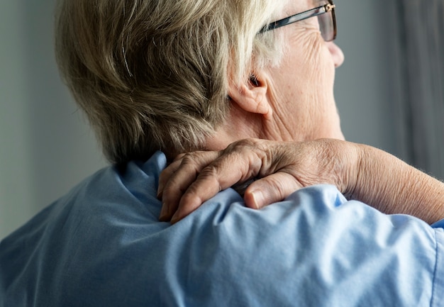 Elderly woman with back pain