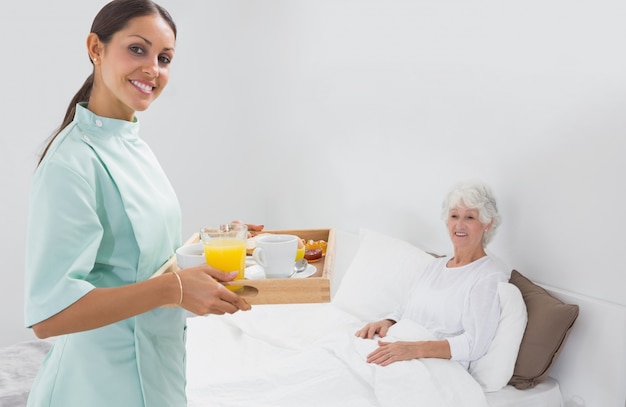  Elderly woman with home nurse