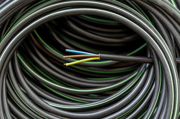 Electric cable wire with green yellow brown and blue smaller wires an electrical installation materi