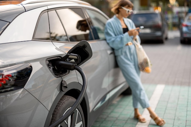 Electric car charging outdoors