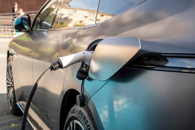 Electric car charging process Russia Moscow 30 September 2024