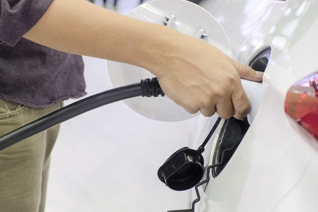 Electric car charging in a station