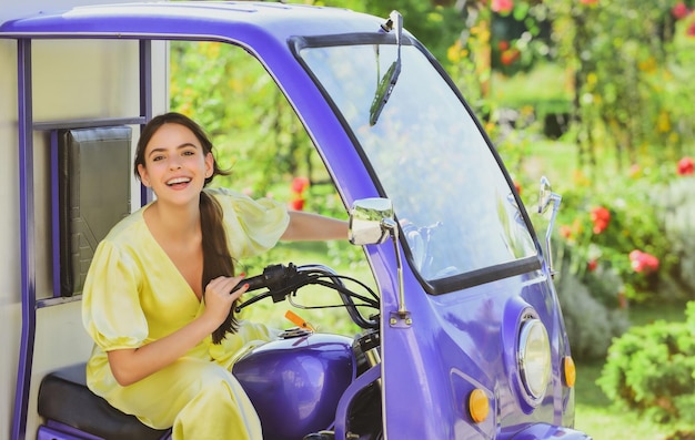 Electric cars saving ecology happy girl in electro car