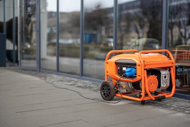 Electric generator on a street near shop or cafe