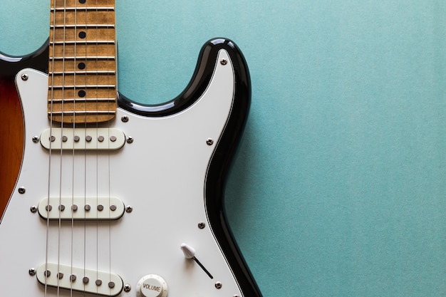 Electric guitar on green