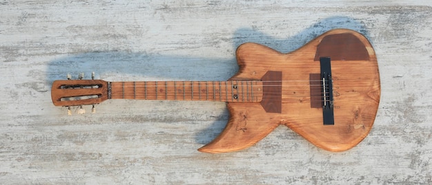 electric guitar on wooden background