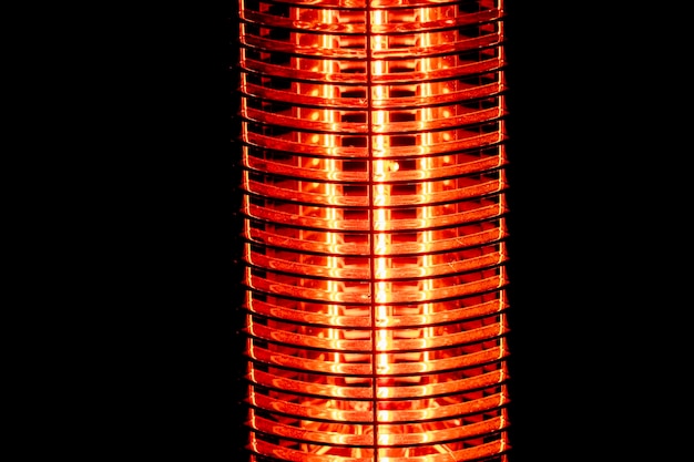 Electric heater detail isolated on black