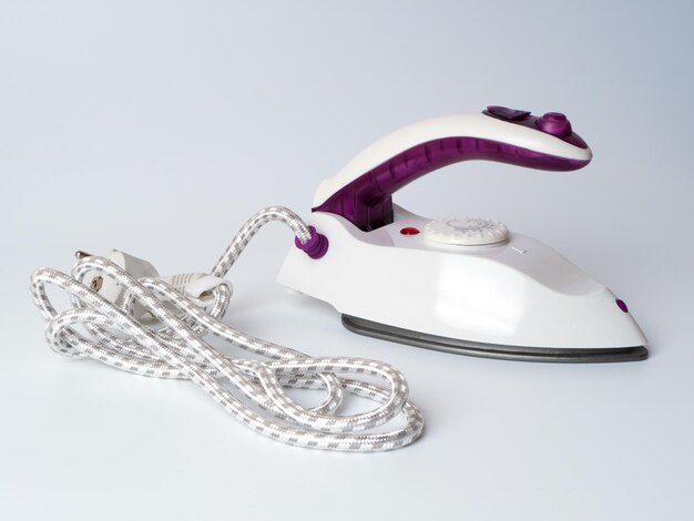 Electric iron with foldable handle Ideal for travelling Compact and light