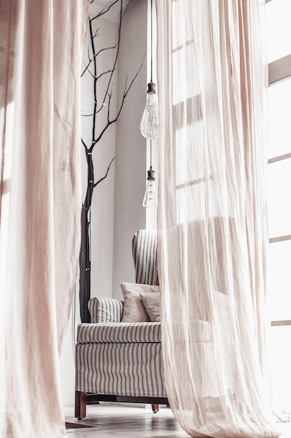 Electric lamp hanging on bed at home