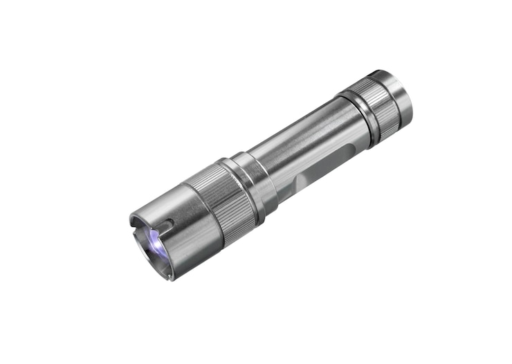 Electric LED torch isolated on a white