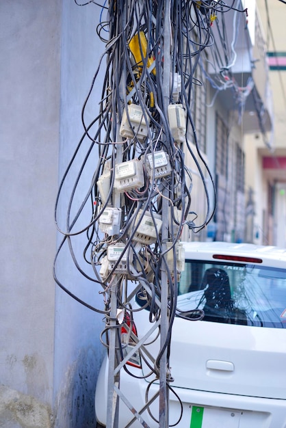 Electric meters on pole in the street