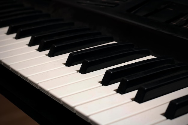 Electric piano keys close up side view