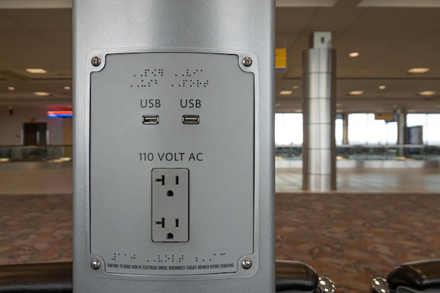 Electric power charger at airport terminal