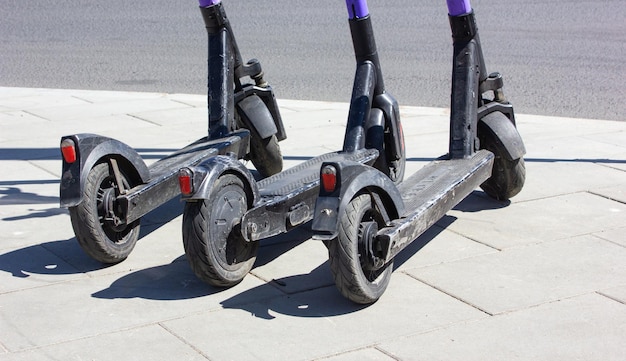 Electric scooter parking in the city Public ecotransport Electric scooters in the city