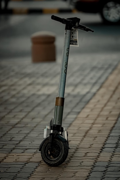 Photo electric scooter on a sidewalk