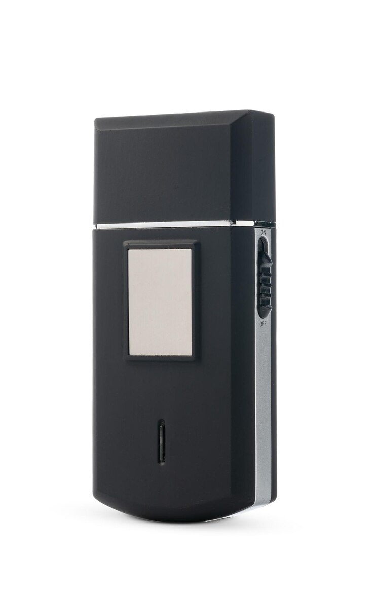 Photo electric shaver on white background studio shot