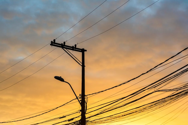 Electric and telephone cables and wires on a pole in the\
streets of the metropolis