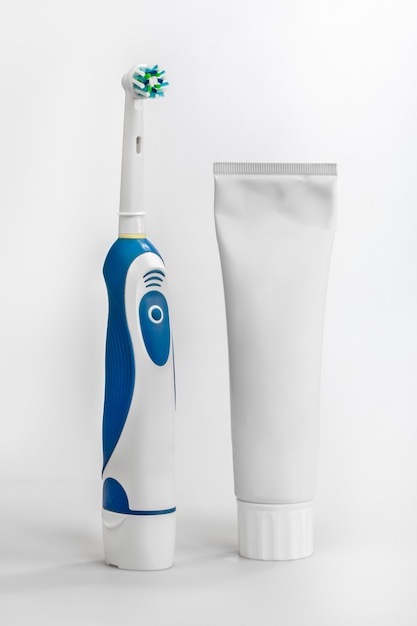 Electric toothbrush and tube of toothpaste