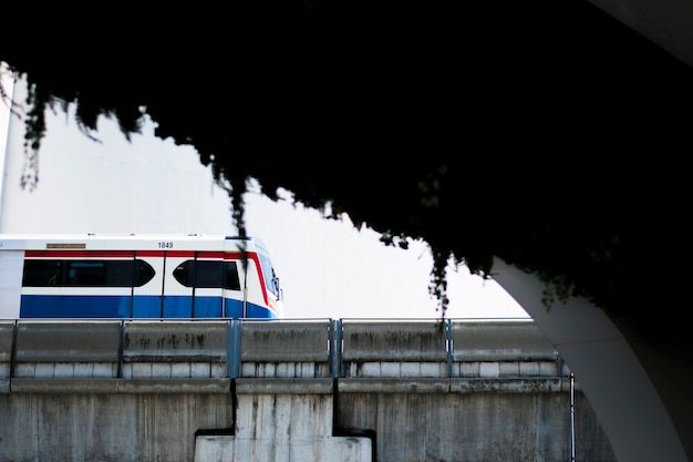 Electric train running on rails