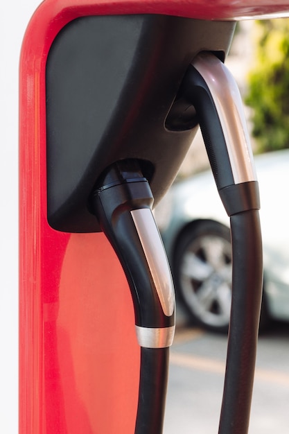 Electric vehicle charging sockets in a power station. the\
future of the automobile concept