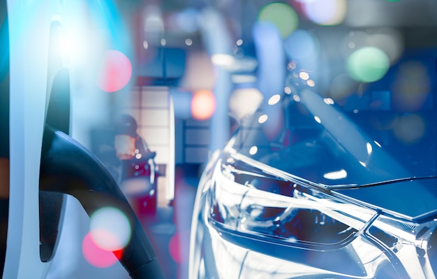 Electric vehicle charging station and EV car in a showroom Electric vehicle dealership Clean