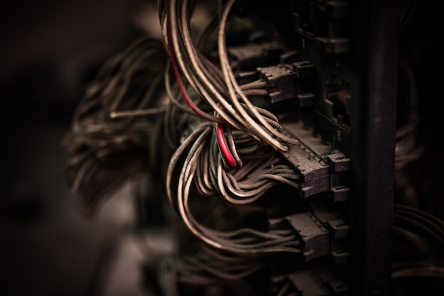 Photo electric wiring from back view of old car engine control unit