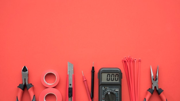 Photo electrical equipment arranged at the bottom of red background