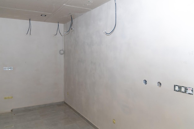 Electrical installation in a room on the construction site