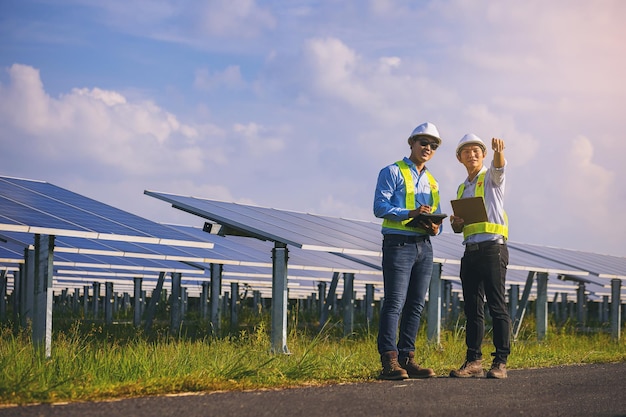 electrical instrument technician survey checking maintenance electric system at solar panel field