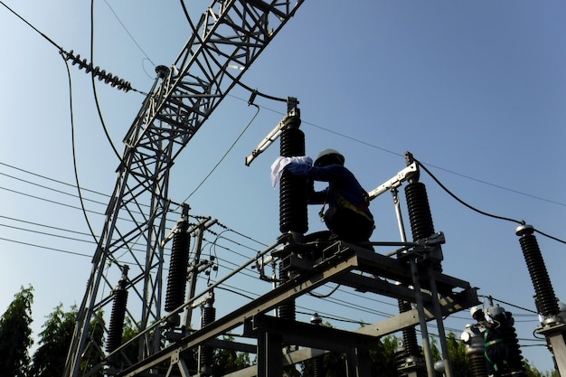 Electrical Preventive Maintenance Disconnecting switch bushings cleaning in substation