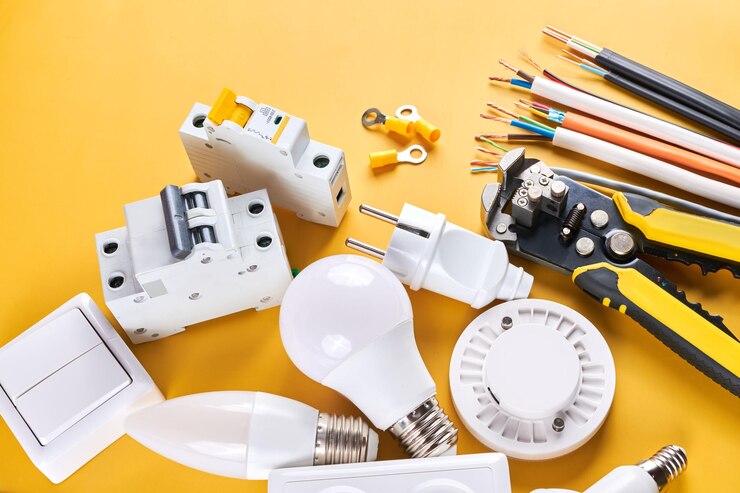 Photo electrical tools set with dimmer switch isolated on yellow background with copy space controllable lighting saving energy concept building and renovation