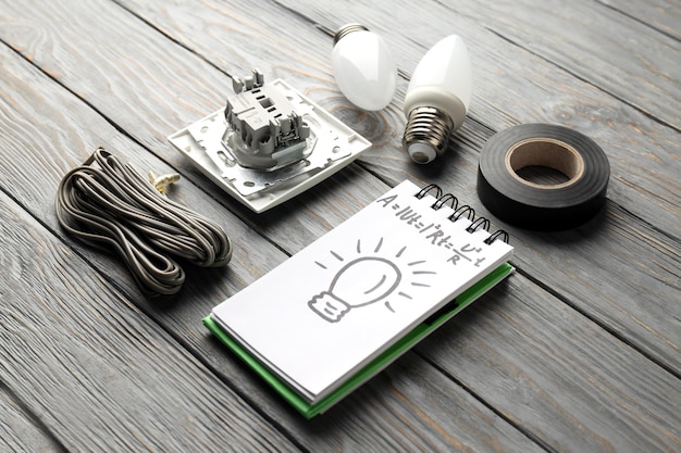 Electrician or electrical tools on wooden table