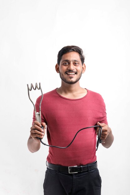 Electrician holding water heater in hand