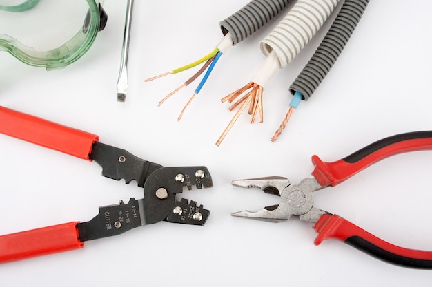 Electrician's tools. Pliers, cables, cutter and screwdriver