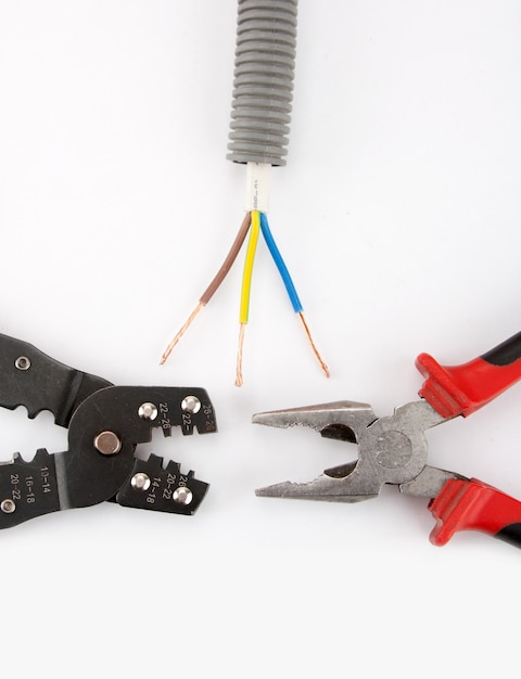 Electrician's tools. Pliers, cutter and cable