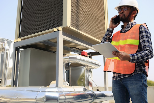 Electricians are working on equipment inspection and maintenance