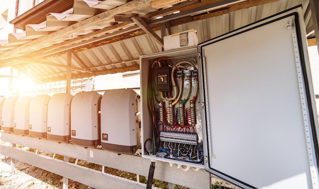 Electricity distribution box with wires and circuit breakers. Fuse box.