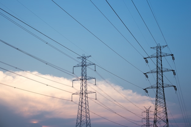 electricity post at sunset