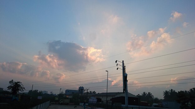 Electricity pylon at sunset