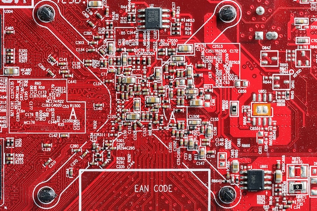 Electronic circuit board close up, processor, chips and capacitors.