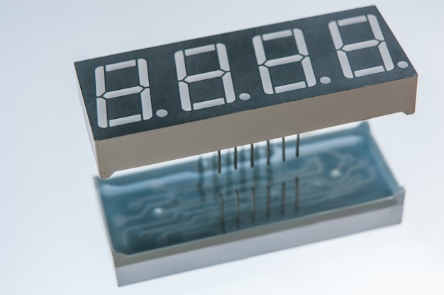 Electronic clock display on white background