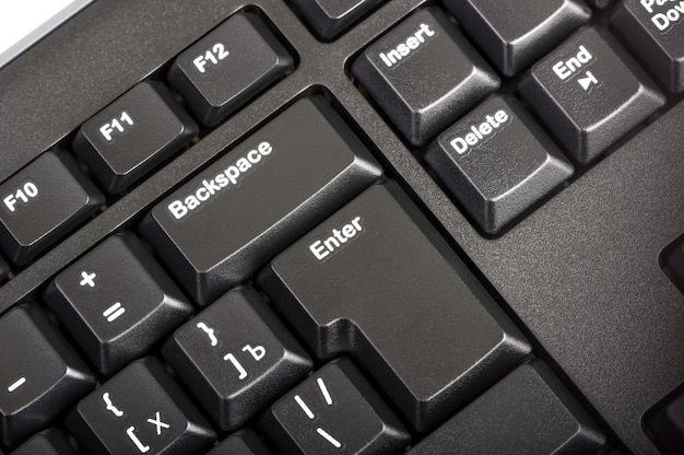 Photo electronic collection - close-up black computer keyboard with russian letter and key enter